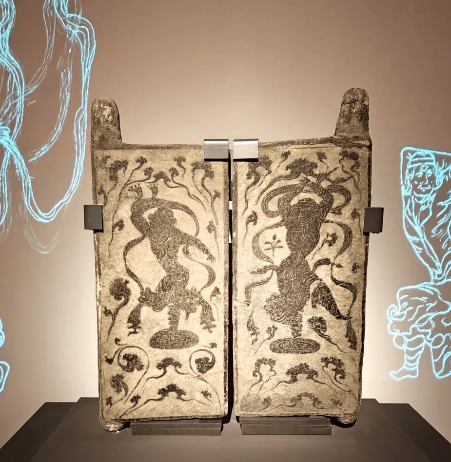 宁夏博物馆石刻胡旋舞墓门上的浅浮雕胡人舞者_1