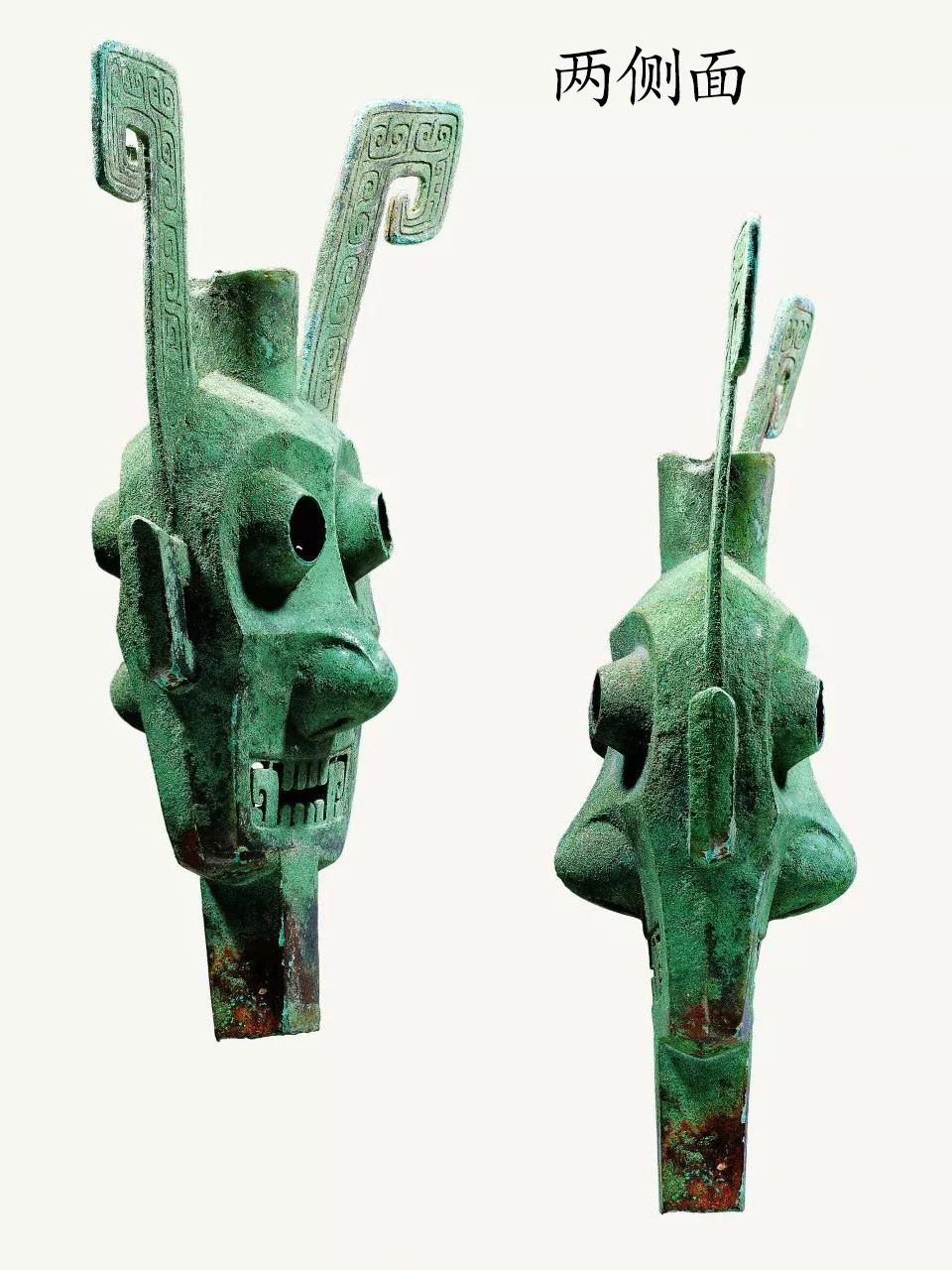 商代双面神人青铜像眼凸嘴张顶插双角_1
